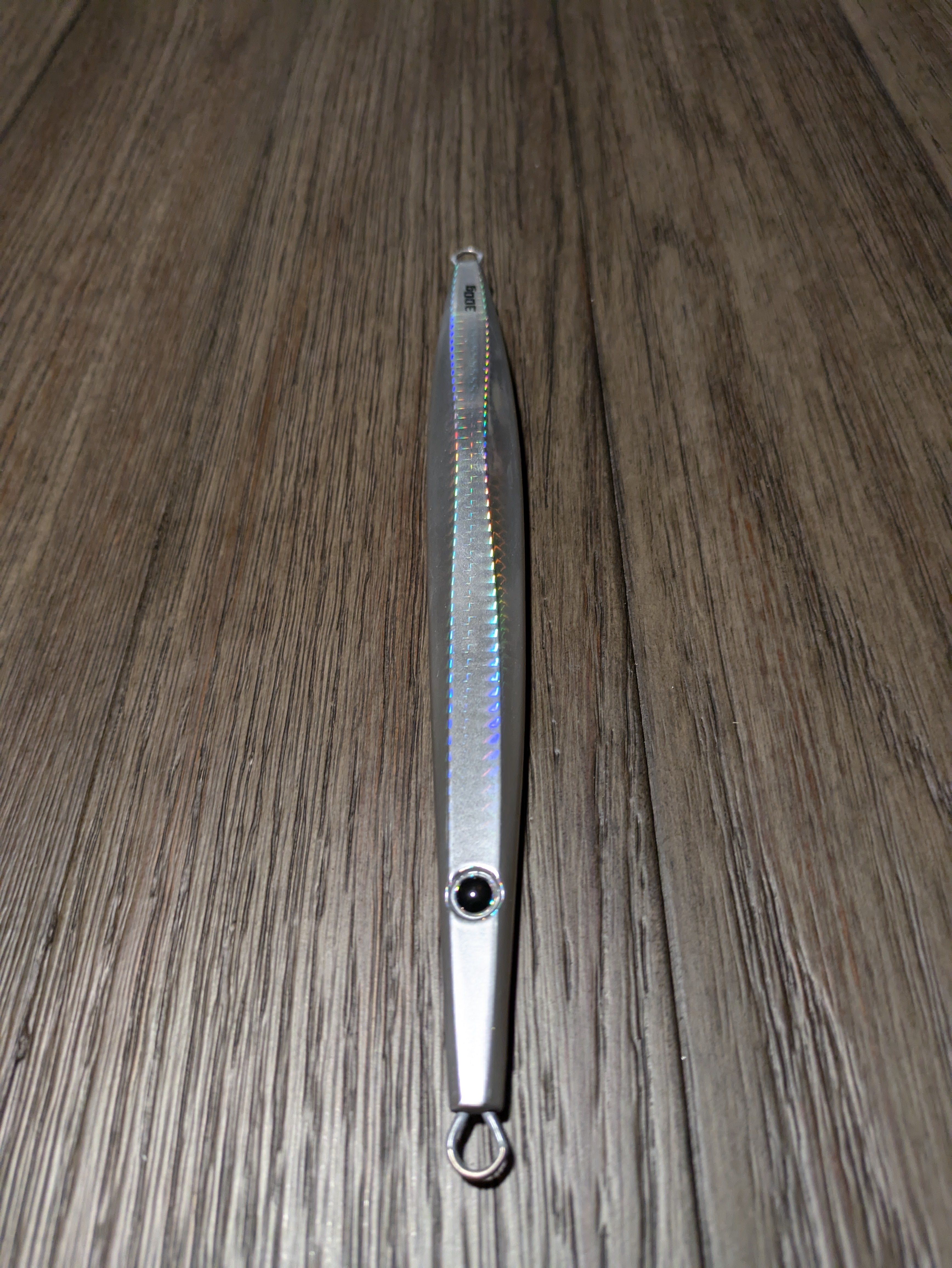 TJC101 The Taurus Slow Pitch Jig: Ghost Sliver Flash with Glow.