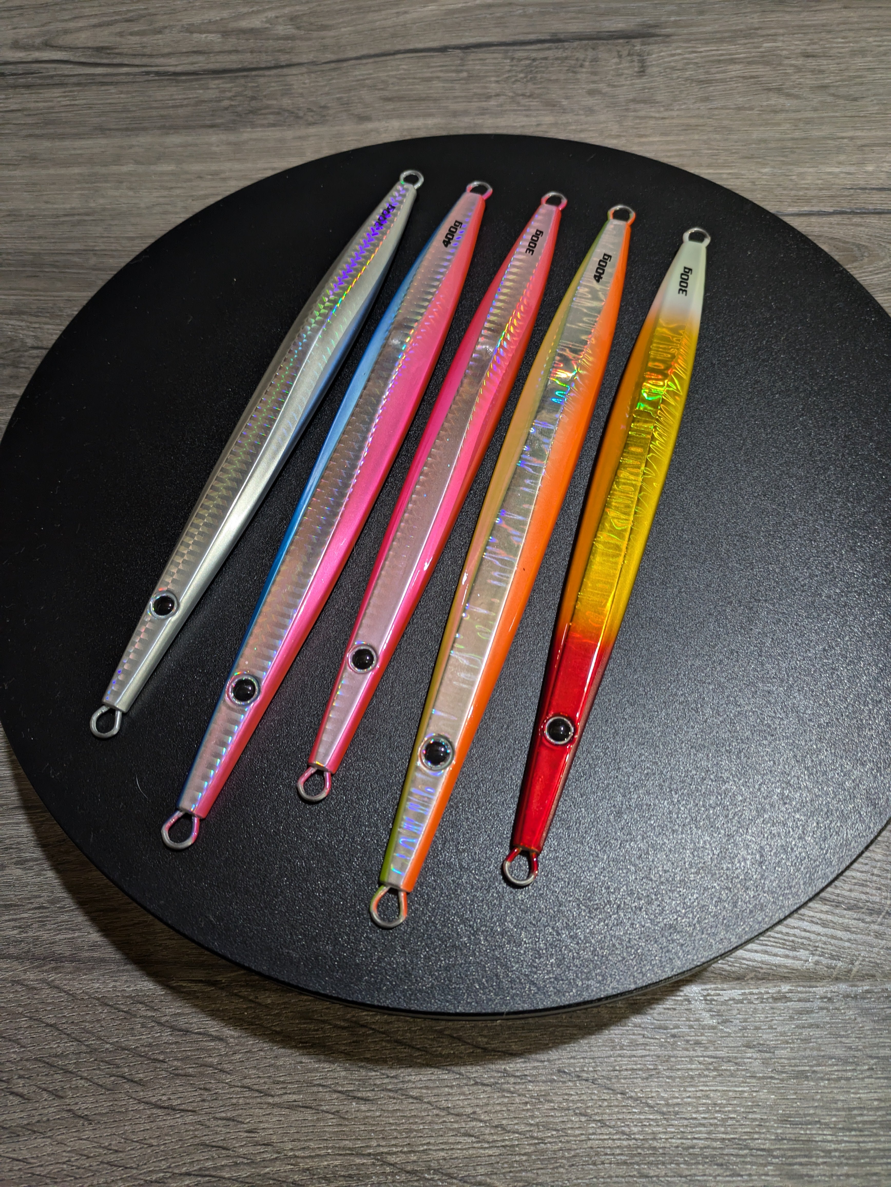 TJC101 The Taurus Slow Pitch Jig: Ghost Sliver Flash with Glow.